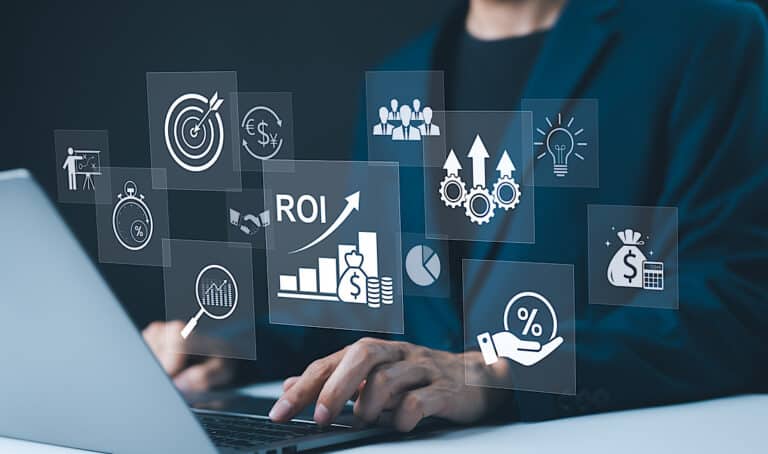 Analyzing ROI and Business Strategy Concepts. Businessman working on a laptop with various digital icons representing ROI, financial strategies, return on investment, and efficiency.