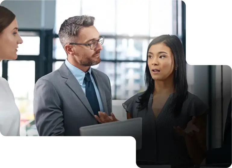 Woman and man talking in business environment