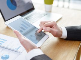 businessman checking financial reports on table businessman checking financial reports on table